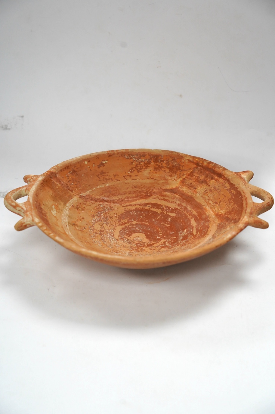 An Ancient Greek terracotta two-handled dish, circa 5th/4th century BC. Condition - good restored condition